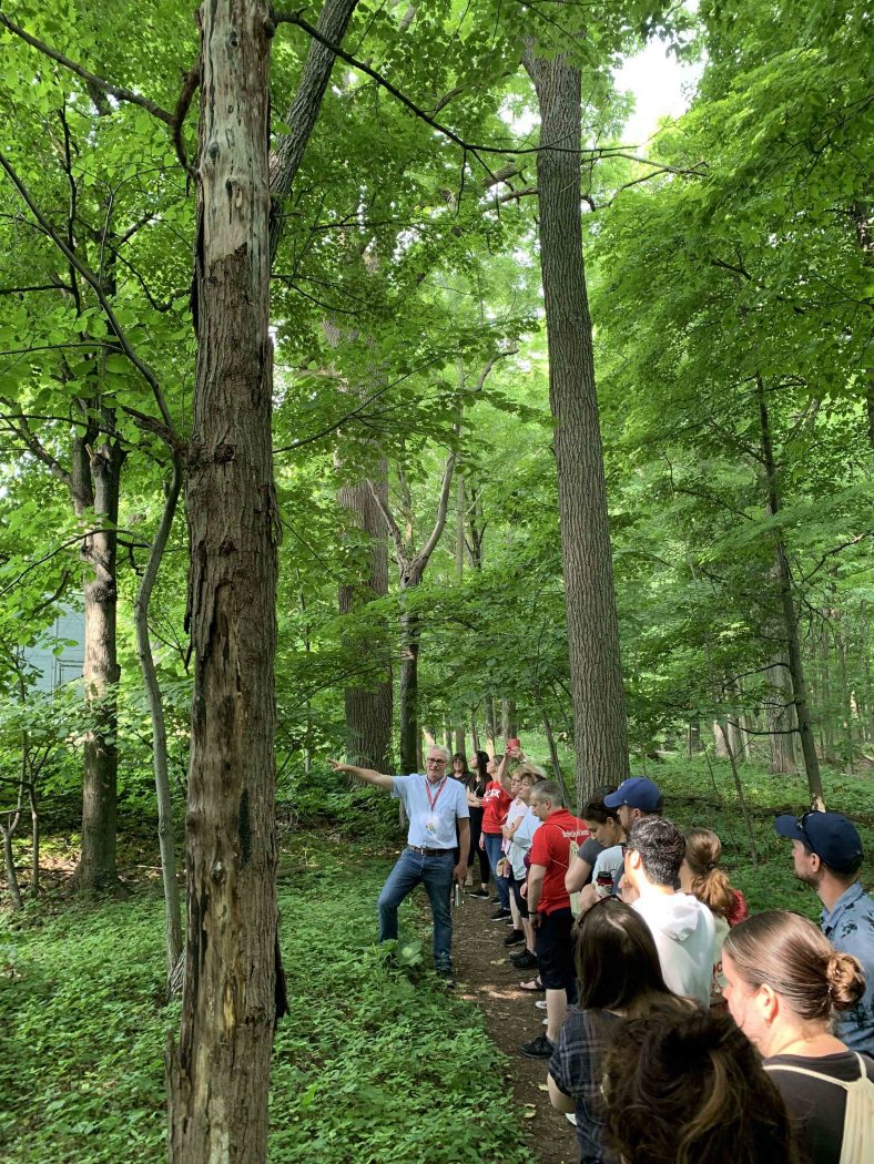 Jon Dick, Manager, Grounds Services, Facilities Management leads a native plant walk along one of Brock’s nature trails.