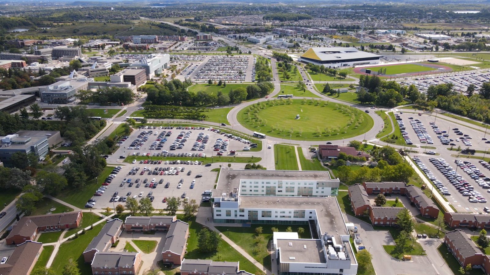 An aerial view of parking lots on Brock University's campus.
