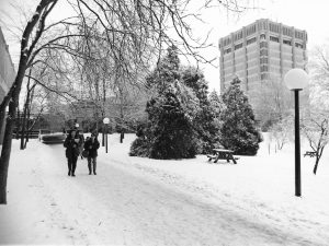 Students walk outside in the snow at Brock University.