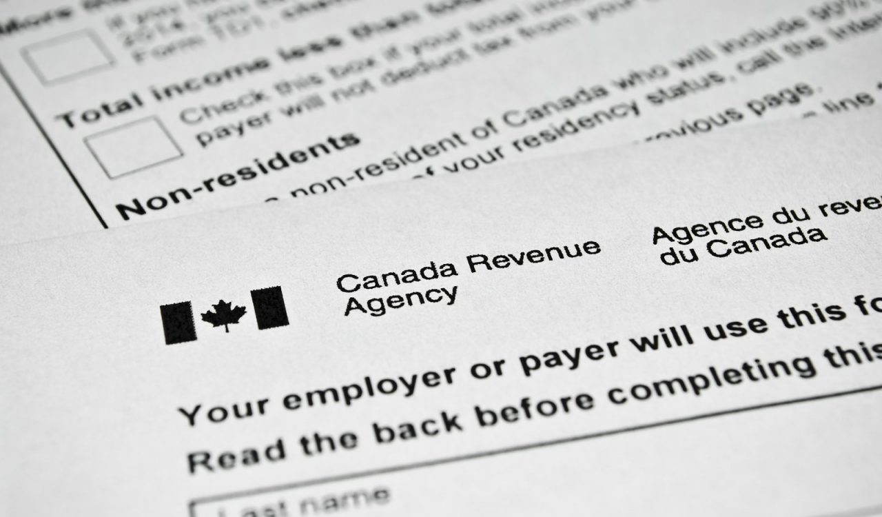 Close-up shot of Canada Revenue Agency tax forms.