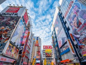 Colourful signs and billboards in Akihabara, Tokyo, Japan, show anime characters.