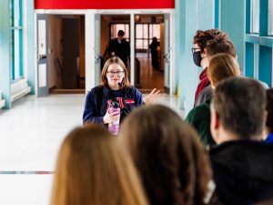 A woman guides a group of prospective students through Brock University’s main campus.