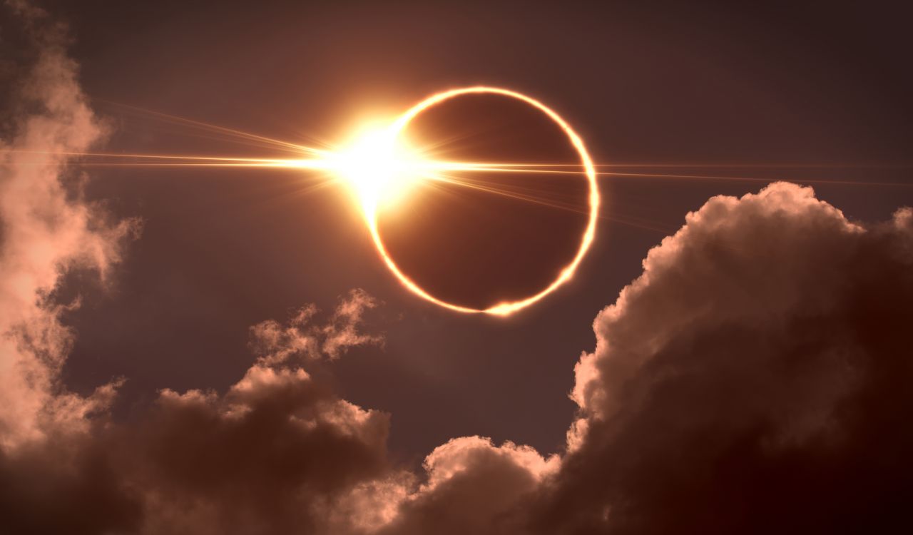 The moon covers the sun during a solar eclipse.
