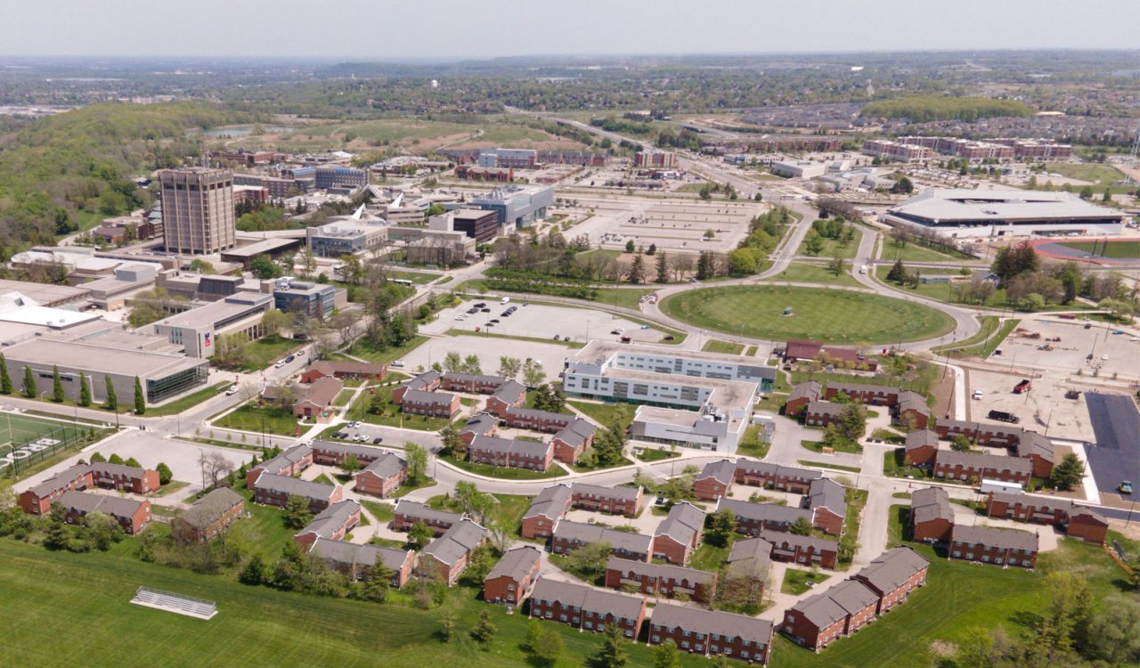 Aerial view of the west end of Brock’s campus over Alumni Field with Village Residence in the foreground.