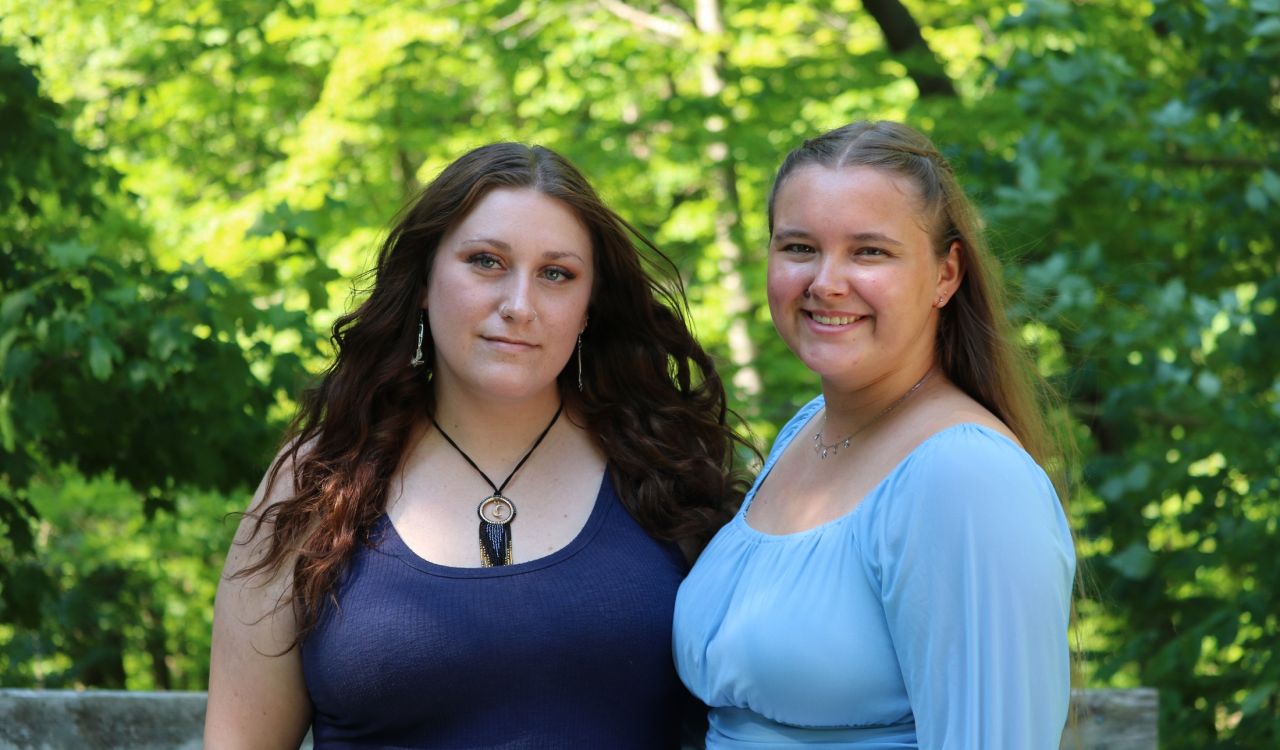 Kaitlyn Austin (left) and Evelyn Dilworth (right) pose for a photo on Brock’s campus.