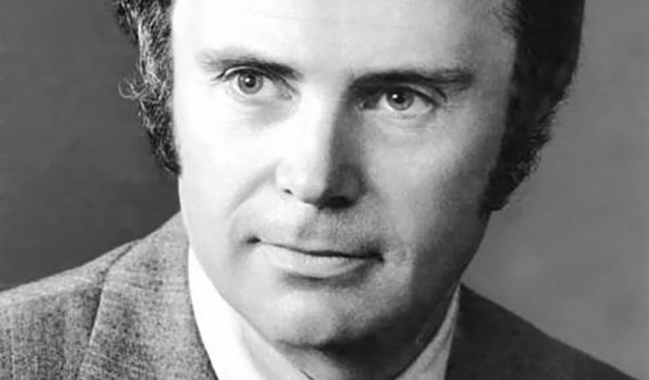 A black-and-white portrait of Alan Earp, former President of Brock University.