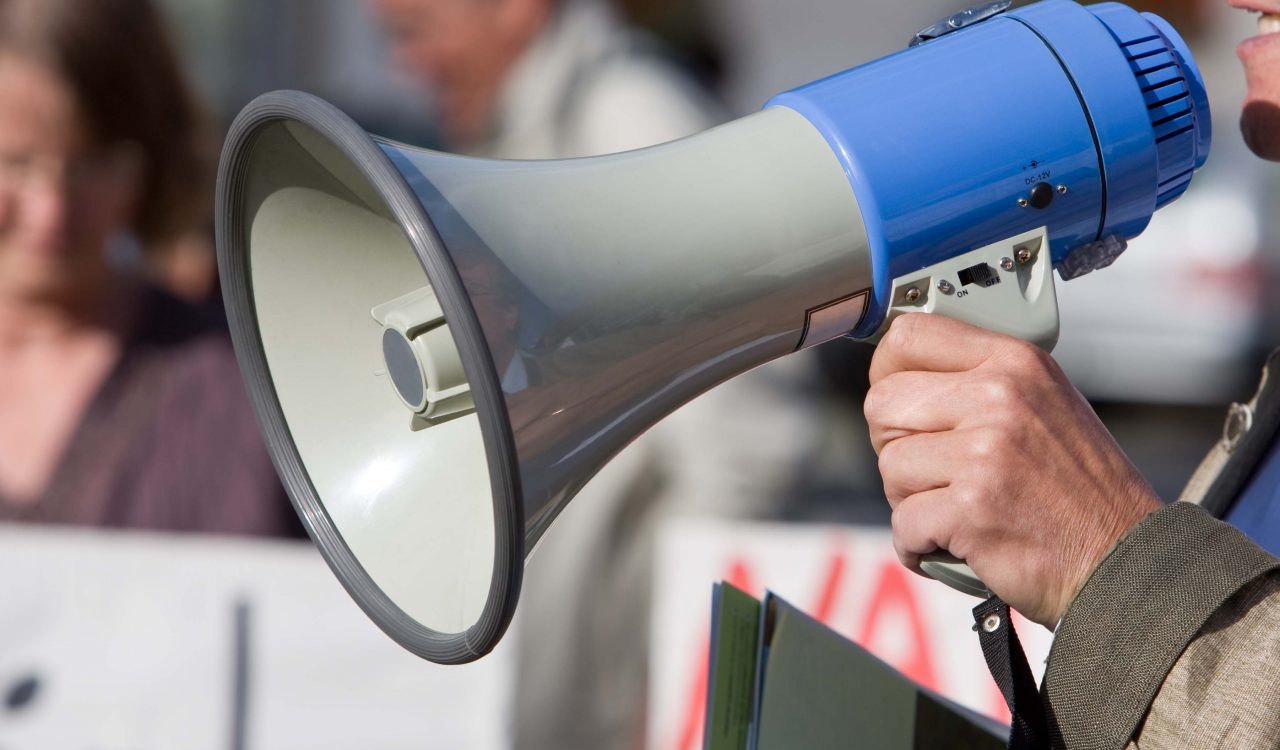 Close up of a megaphone during a demonstration.