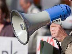 Close up of a megaphone during a demonstration.