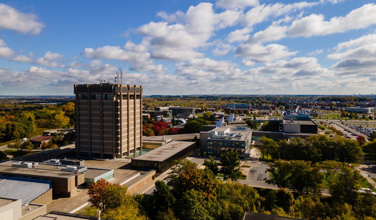 An aerial view of Brock University's main campus on a sunny fall day.