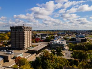 An aerial view of Brock University's main campus on a sunny fall day.