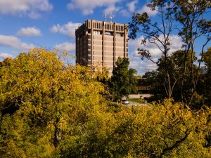An aerial view of Brock University's main campus on a sunny fall day.
