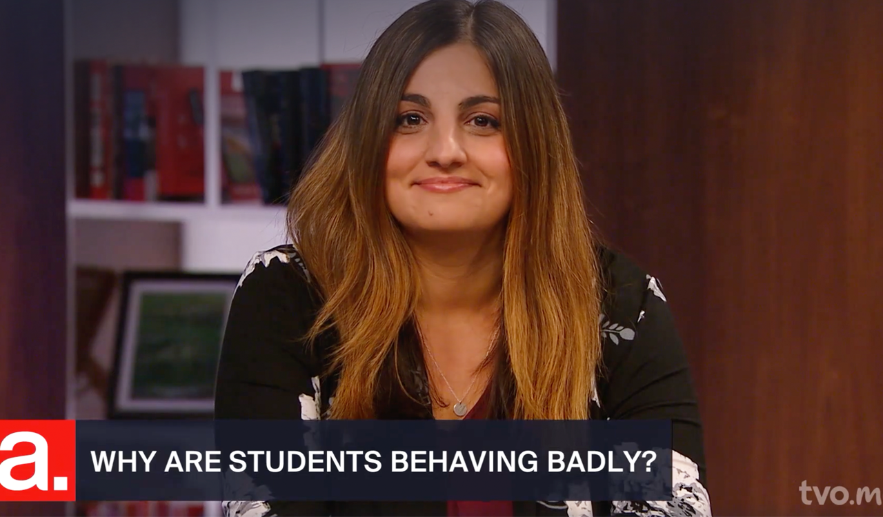 Natalie Spadafora conducts a television interview in the studio with TVO