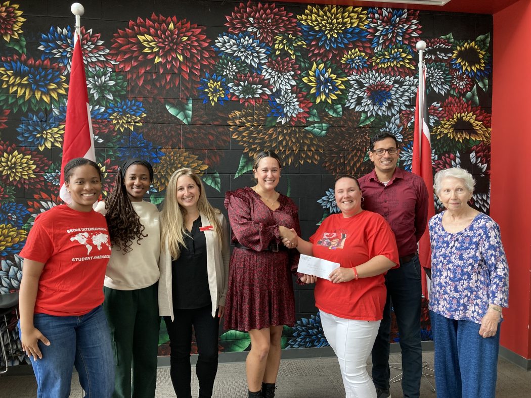 A group of people pose for a photo.