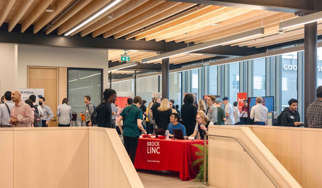 A large group of people at a networking event.