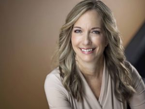 A portrait of Dina Bell-Laroche.