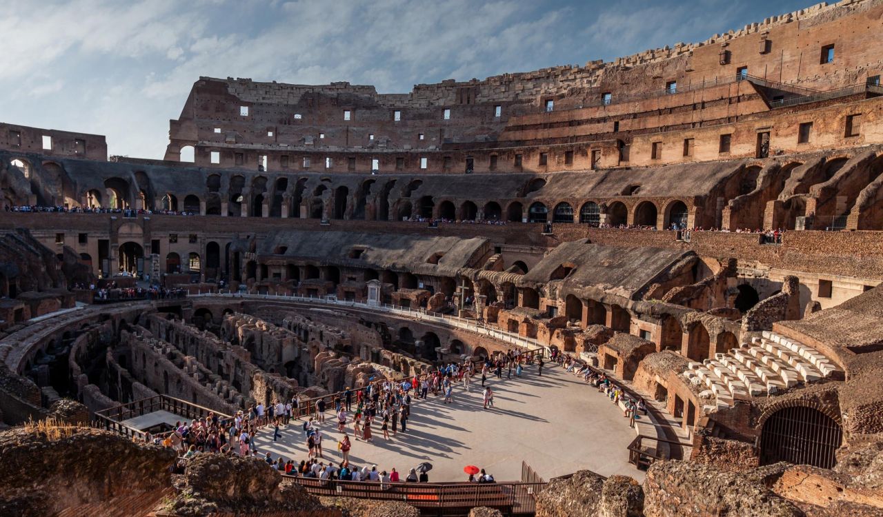 Tourists inside the Coliseum in Rome.