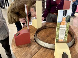 Two people explore an interactive exhibit at a museum.