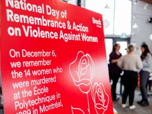 Sign that reads National Day of Remembrance and Action on Violence Against Women.