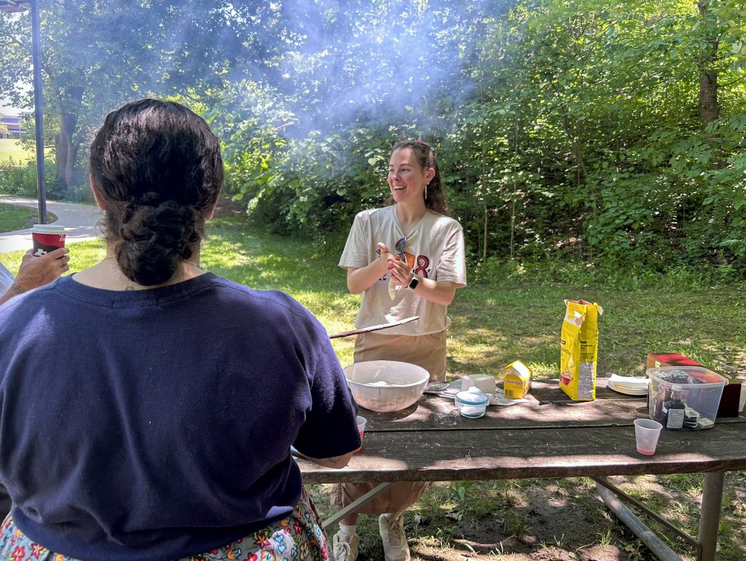 Emily Fortin leads a Bannock Over the Fire workshop on Brock’s campus