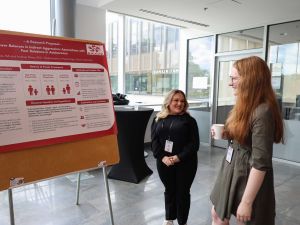 Psychology master’s student Emily Dale and Master of Applied Health Sciences student Mackenzie Pilkington in Goodman Atrium.