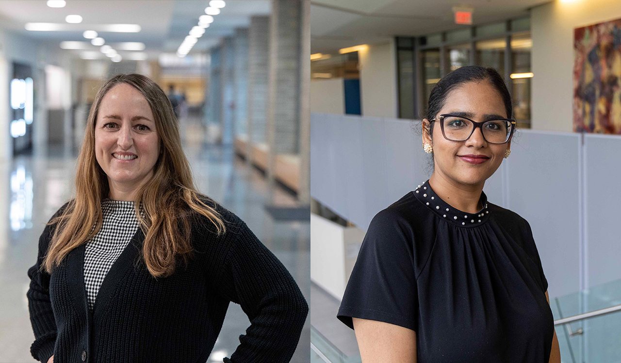 Michelle Vine and Divya Kaur Matta stand in hallways at Brock University.