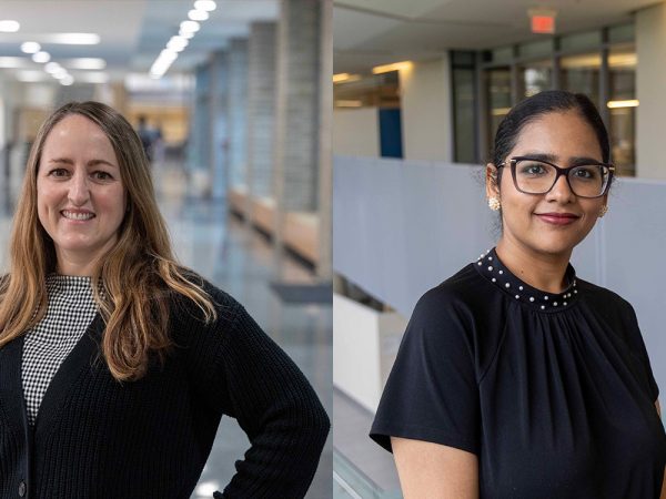 Michelle Vine and Divya Kaur Matta stand in hallways at Brock University.
