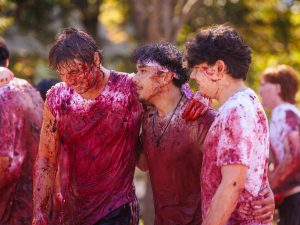 Students stomping grapes at Brock University.