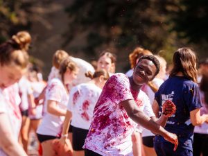 Students stomping grapes at Brock University.