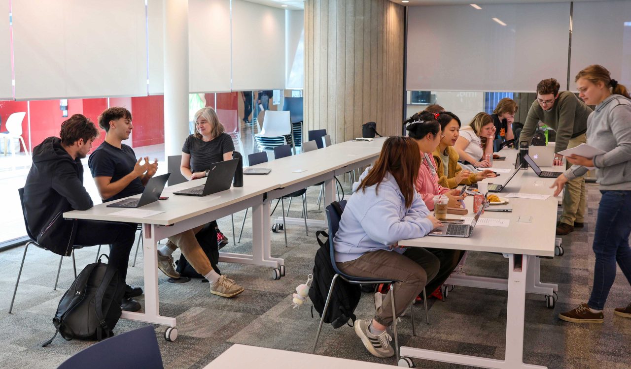 Students and organizers work collaboratively on laptops at Wikipedia Edit-a-thon event at Brock University.