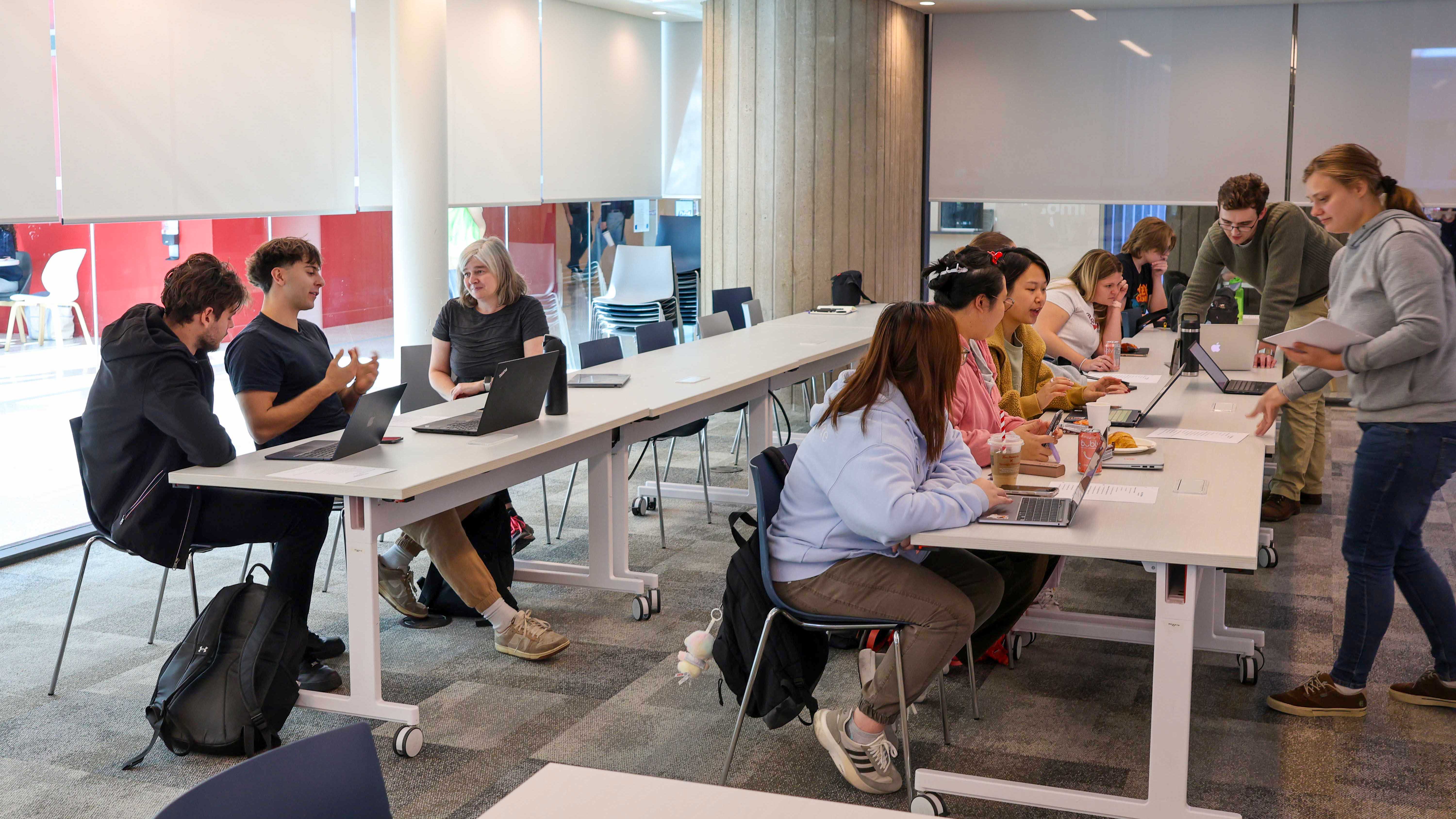 Students and organizers work collaboratively on laptops at Wikipedia Edit-a-thon event at Brock University.