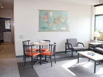 Living room and dining area in Gateway Suites apartment