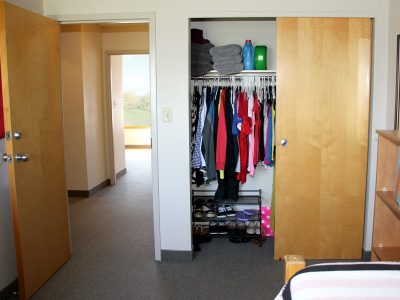 Bedroom and closet in Quarry View apartments