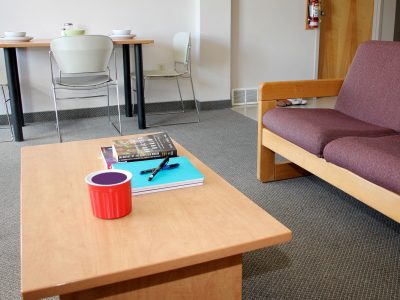 Living room and dining area in Quarry View apartment