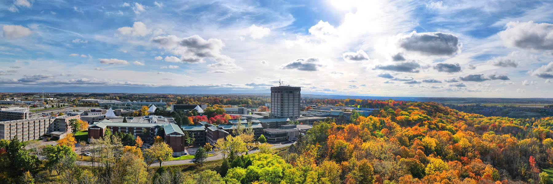 An aerial view of Brock University campus in the fall season.