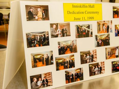 a board with Inniskillin Hall and pictures pasted on it