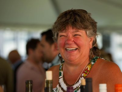 woman laghing at a wine event