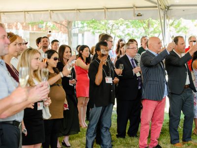 a group of people at an outdoor wine event