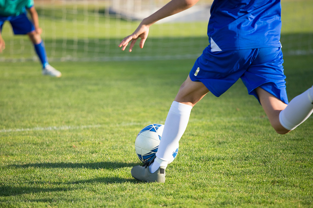 youth playing soccer