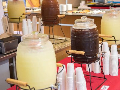 lemonade and iced tea in jars ready to be served