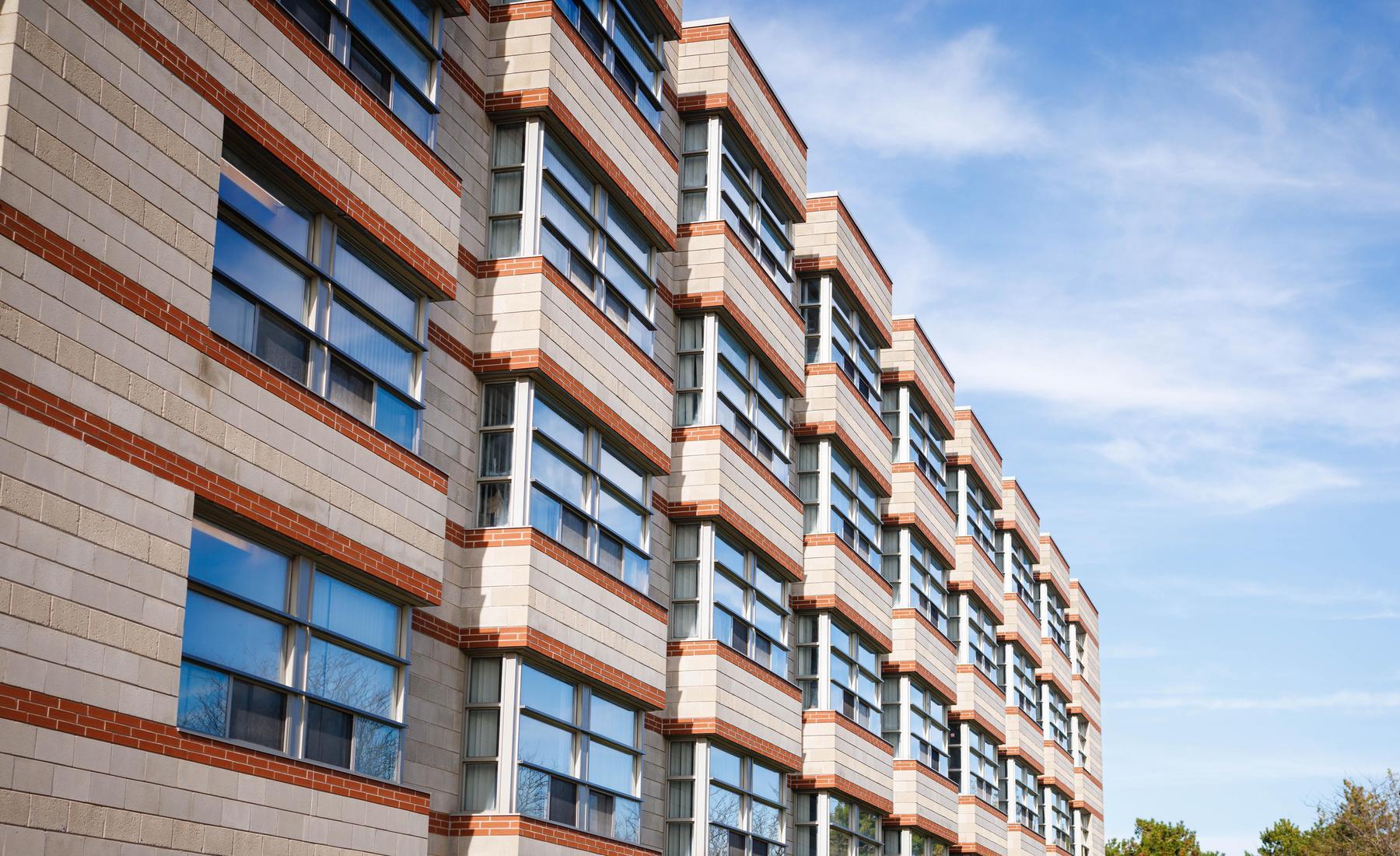 Image of Residence building to left, foreground to background 