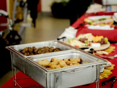 meat and potatoes in buffet containers