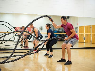 5 students iwith training ropes within the studio at upper level of the Walker Sports Complex