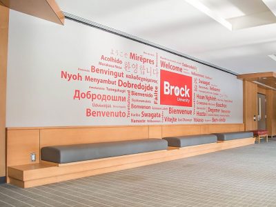 wall with writing and Brock University logo outside Sean O’Sullivan Theatre at Brock University