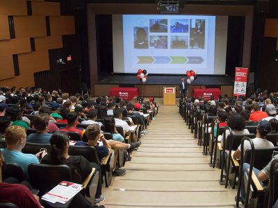 students in seats at The David S. Howes Theatre at Brock University