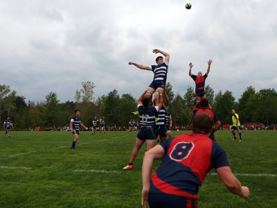 BROCK UNIVERSITY MEN'S RUGBY TEAM playing on alumni field
