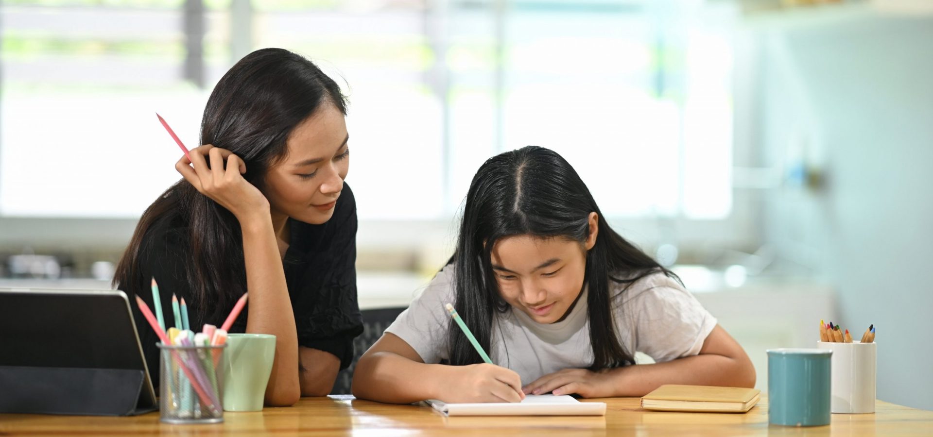 A teacher having one on one time with a student