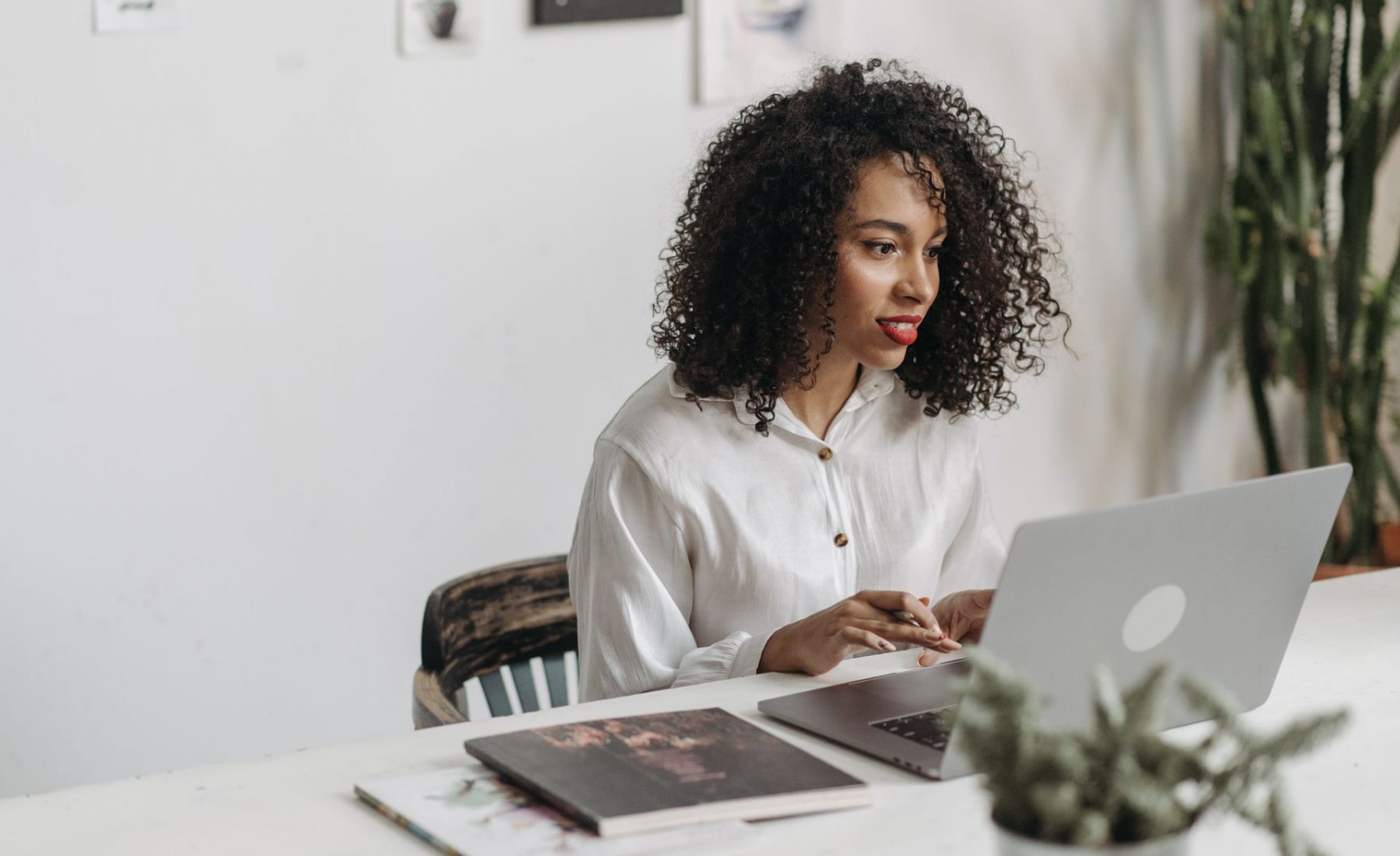 Woman looking at laptop 