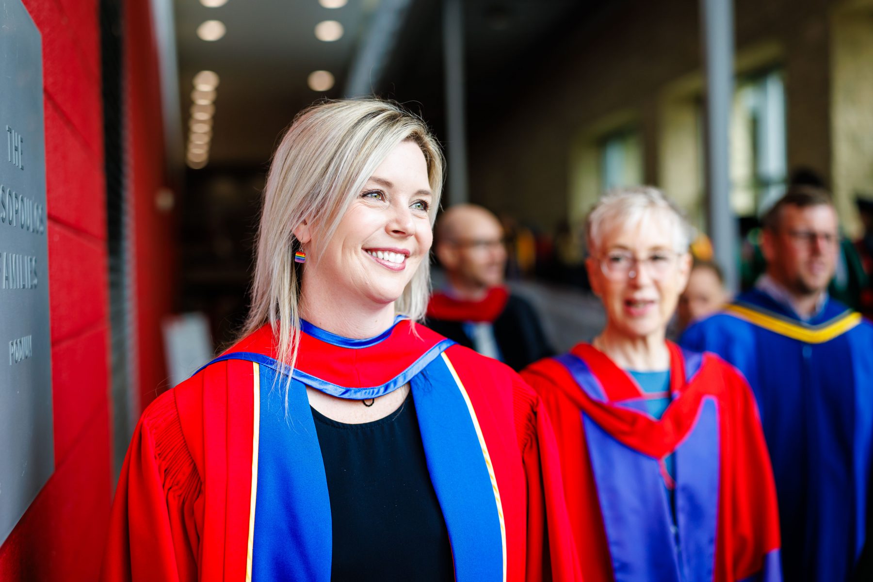 Brock University faculty members in academic regalia participating in a Convocation procession.