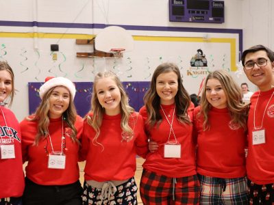 A group of Brock students pose for a photo at a local elementary school.