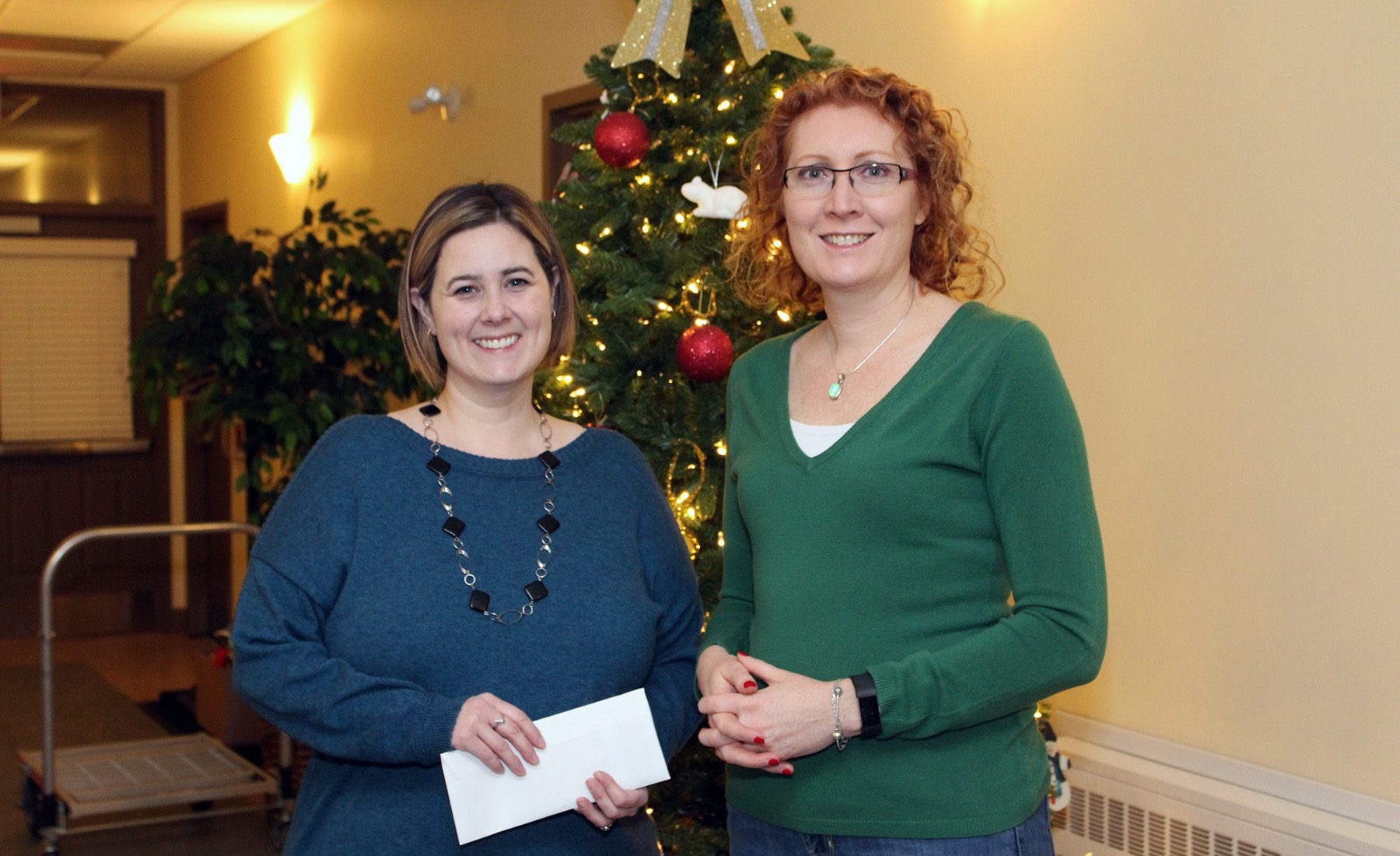 Nicole Regehr, Community Development Manager at Gillian's Place, and Ethna Bernat from the Faculty of Education.